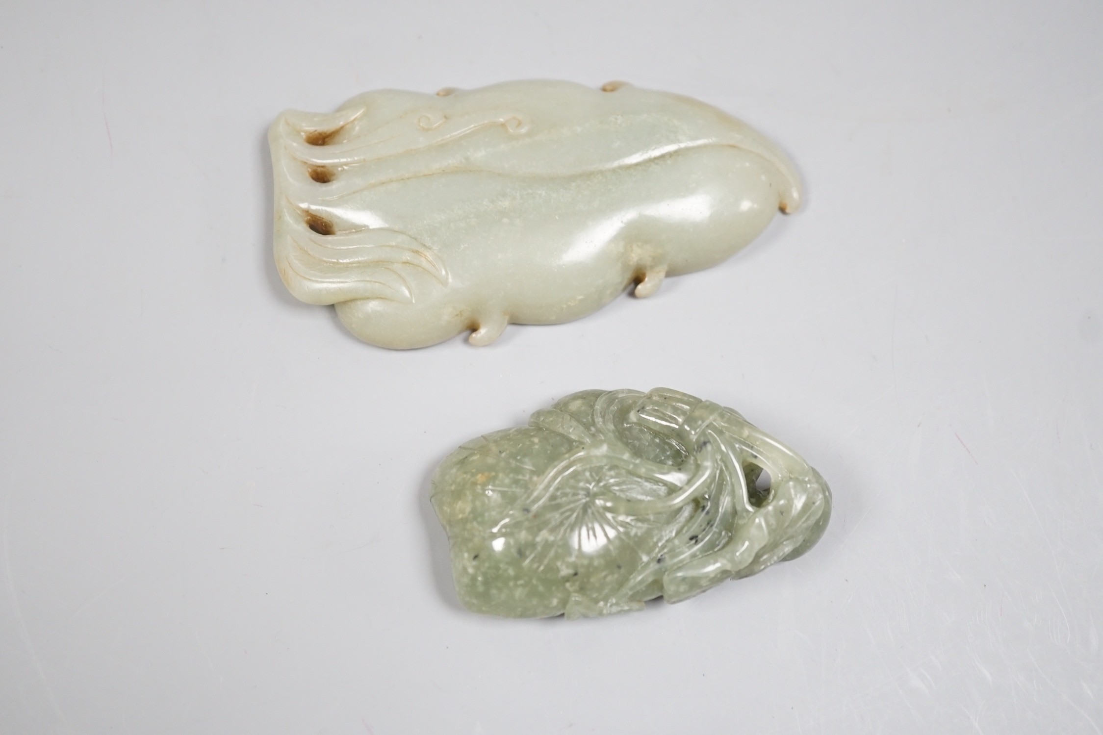 Two Chinese carved jade brushwashers, largest 11cm